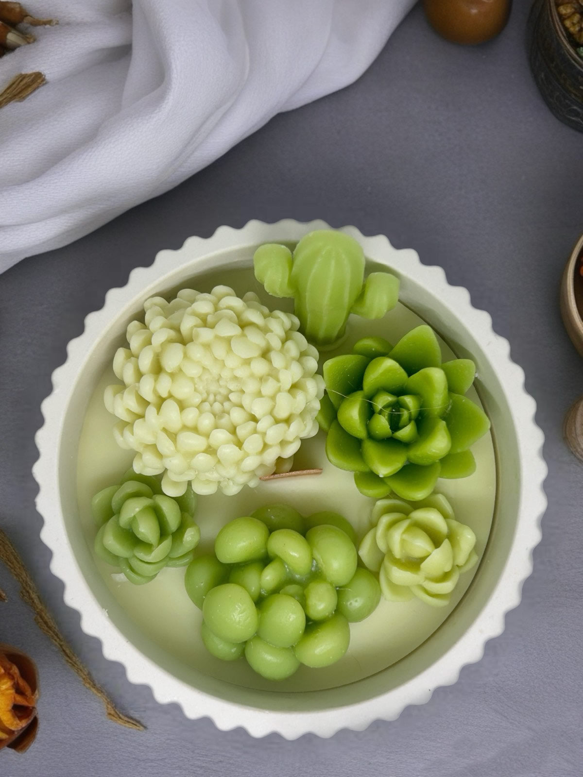 Succulent Candle Arrangement in a Ribbed Pot